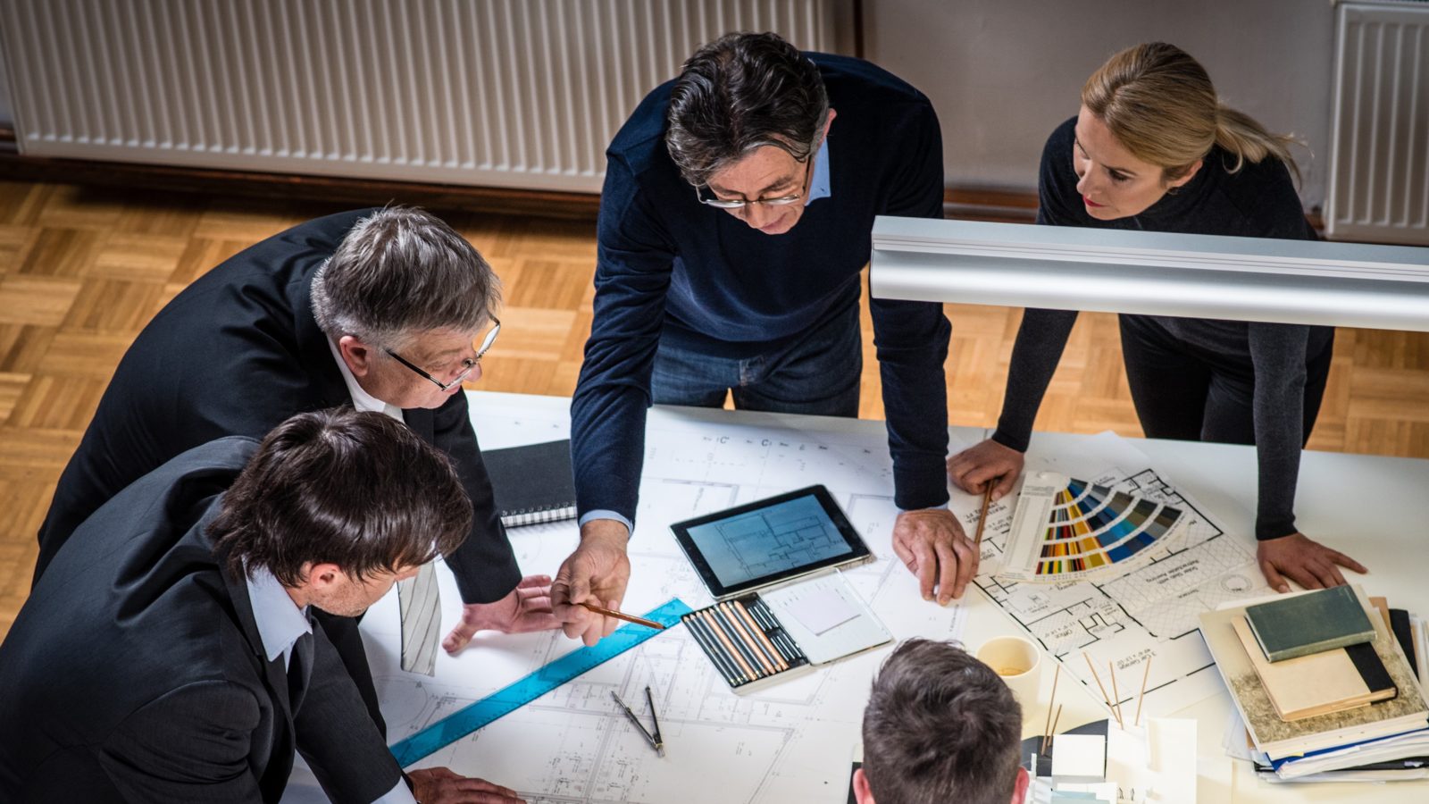 Architects and customer in the office.